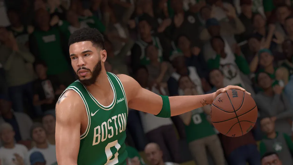 Jayson Tatum of the Boston Celtics dribbles in front of the crowd in NBA 2K25
