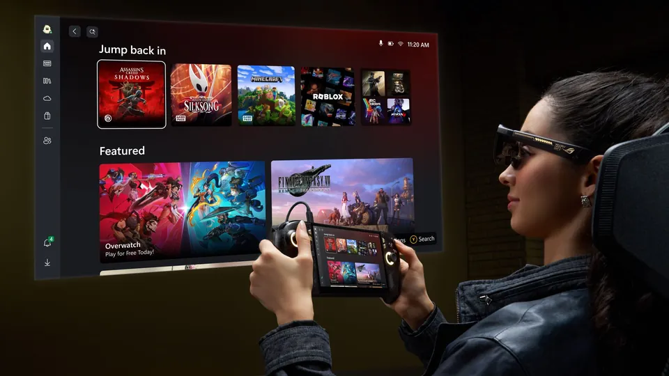 A player in AR glasses sees a giant Xbox home screen while holding the ROG Xbox Ally X20