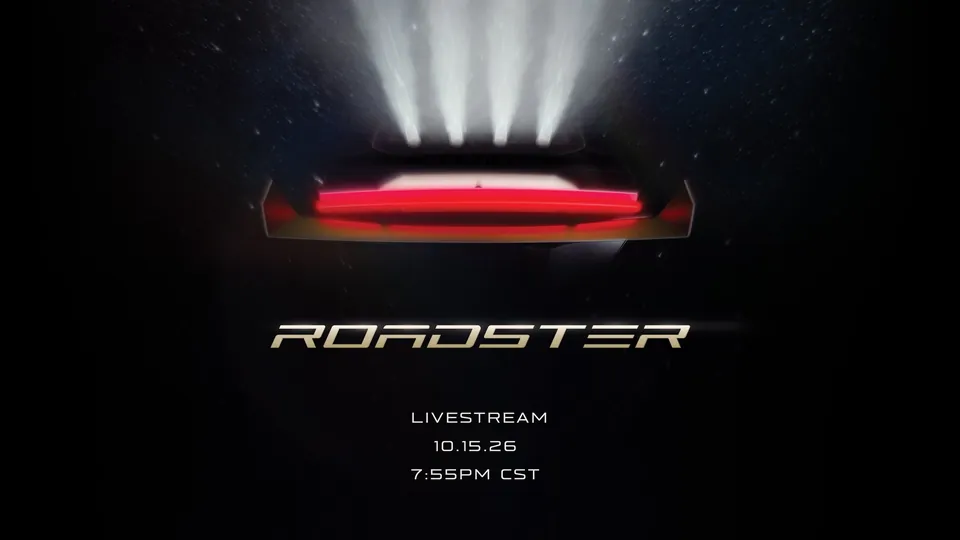 Tesla's teaser for the Roadster livestream: the back of the car lit in red under beams of light, with the date 10.15.26 and 7:55 p.m. CST
