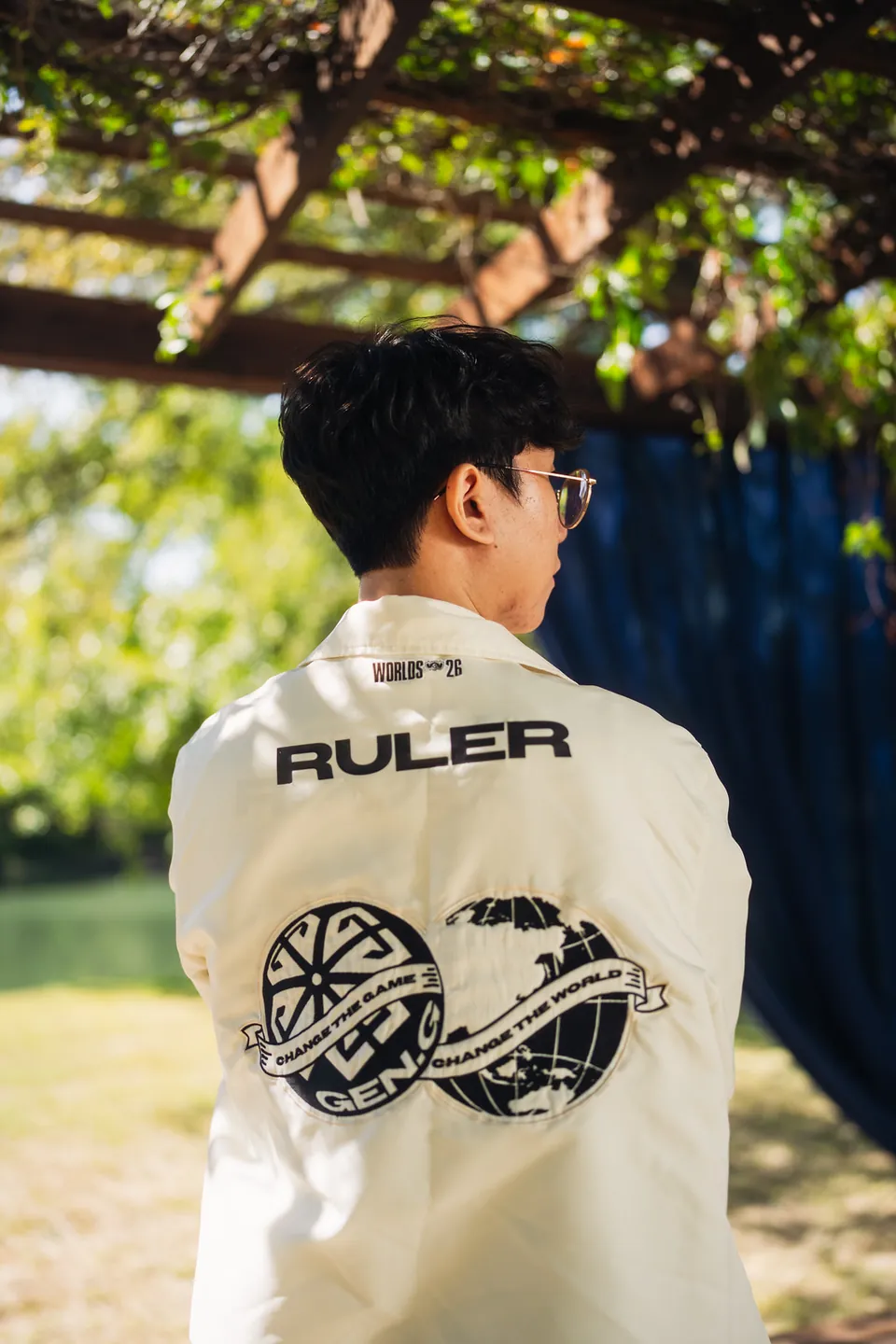 The back of a Gen.G team jacket with the name Ruler at an outdoor Worlds 2026 photo shoot