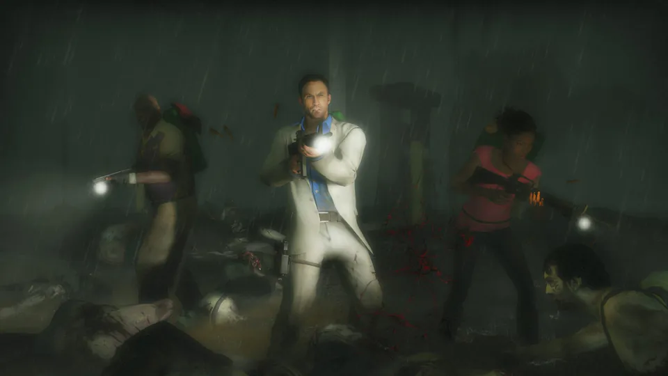 Three survivors with flashlights walk through a dark, rainy street as zombies close in, in Left 4 Dead 2