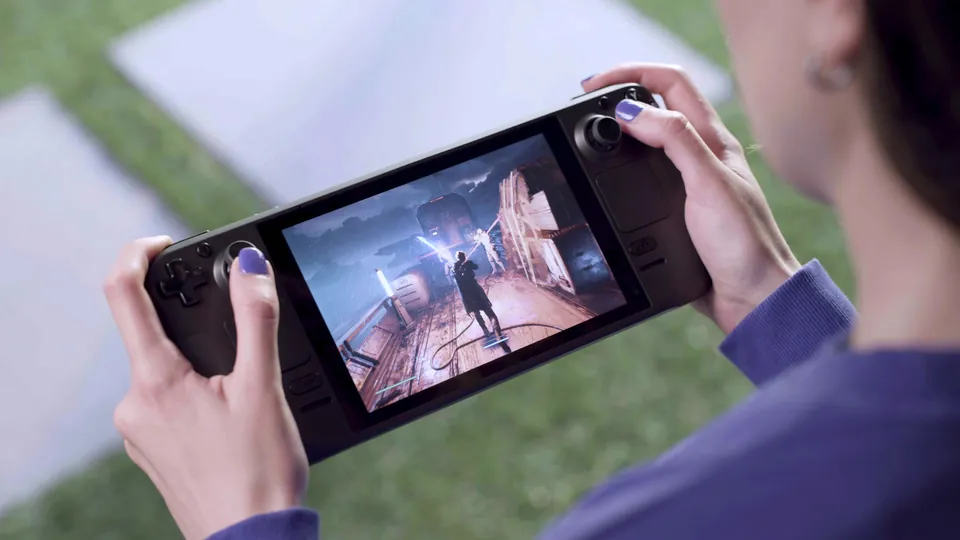 Hands holding a Steam Deck outdoors with a game running on the screen